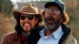 Carlos Elliot Jr. con la leyenda del blues RL Boyce