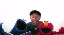 Pharrell con Elmo y el Monstruo Comegalletas